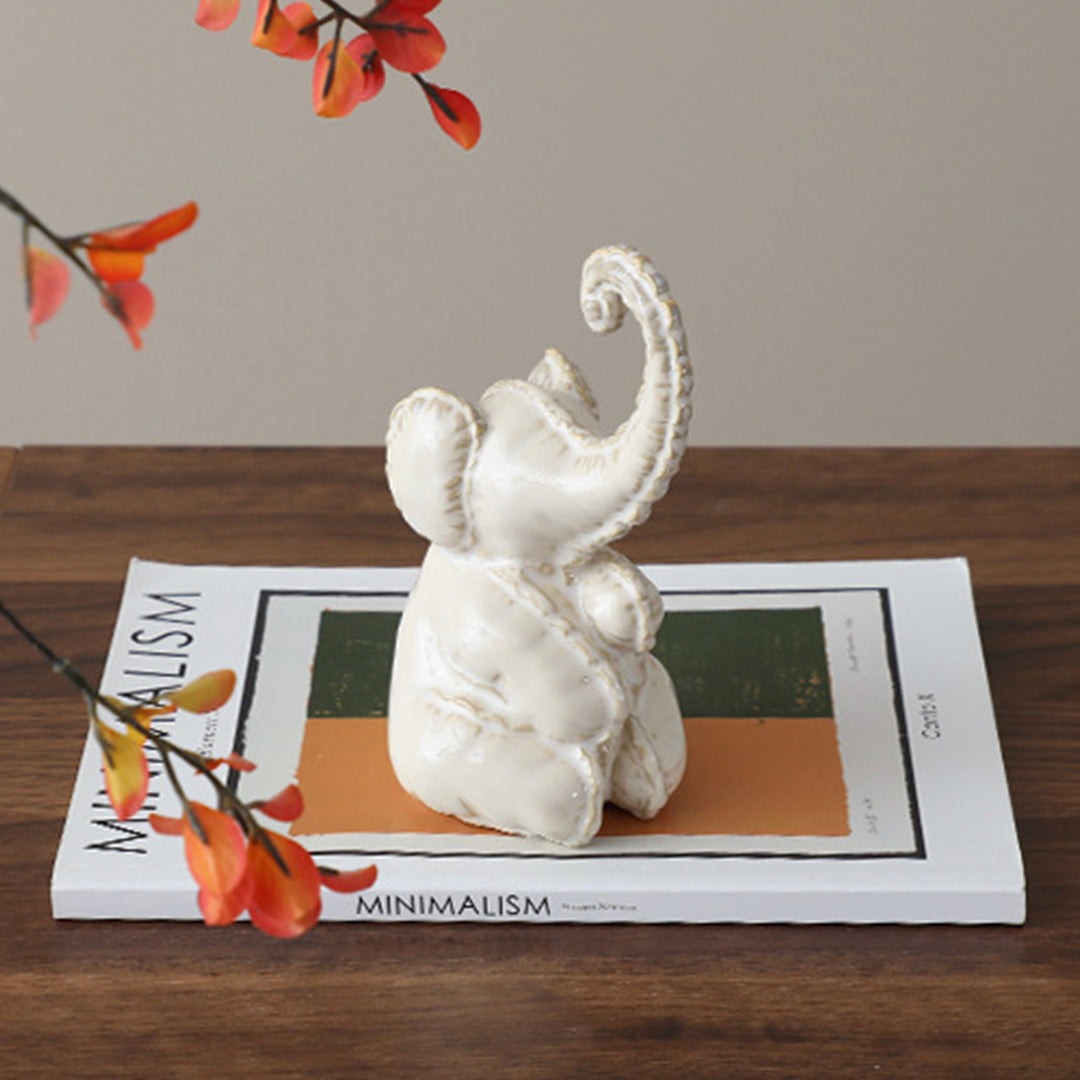 Funny Little Ceramic Elephant -B FD-D25075B - Home Decor Figurines - ebarza Furniture UAE | Shop Modern Furniture in Abu Dhabi & Dubai - مفروشات ايبازرا في الامارات | تسوق اثاث عصري وديكورات مميزة في دبي وابوظبي